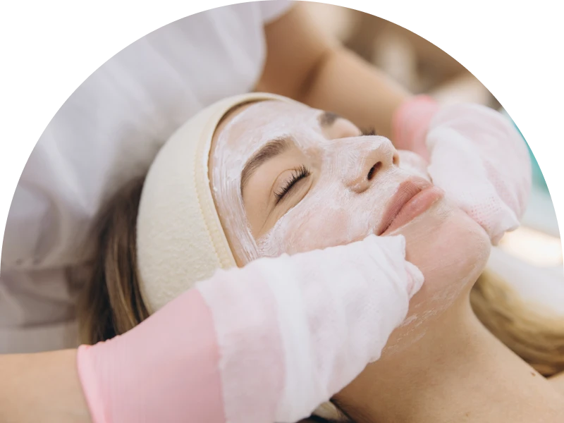 Woman receiving a relaxing facial massage